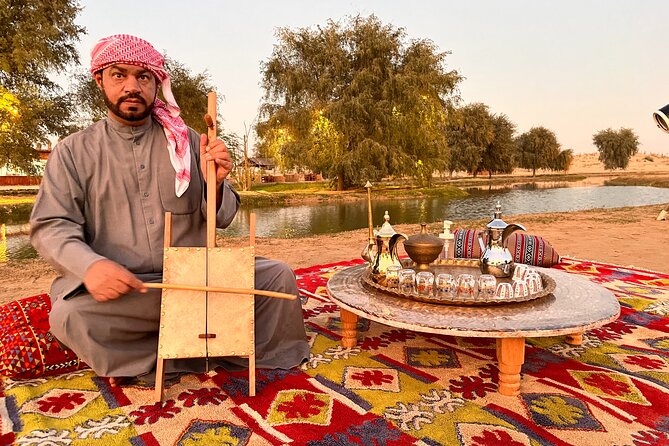 Dubai: Al Marmoom Oasis Vintage Safari: Camels, Stargazing & Meal - Sunset, falcons, and hands-on village activities