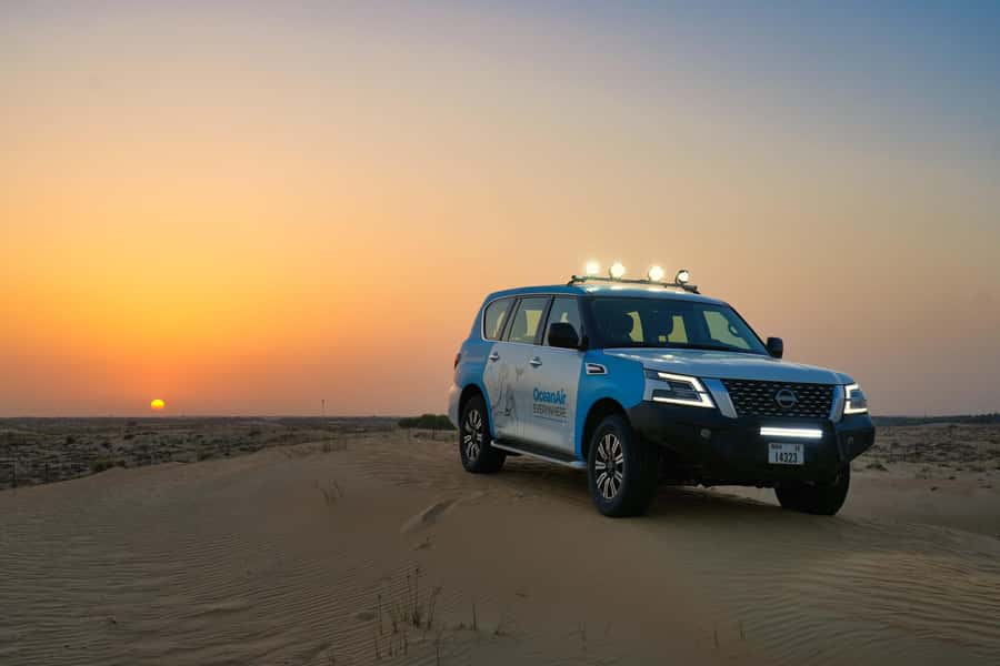 Dubai: Evening Desert Safari with Camel Ride & Stargazing - Leaving Dubai for the red dunes