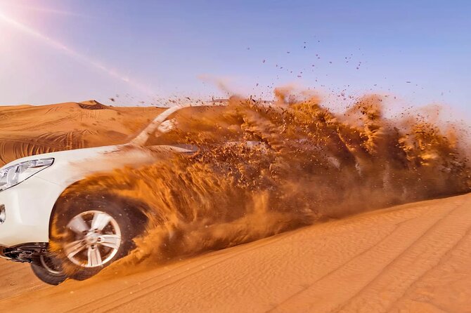 Dubai Red Dunes ATV, Camels, Stargazing & 5<em> BBQ – Key points to know before booking’ /></p>
<ul>
<li><strong>Your own desert vehicle:</strong> Choose a buggy or quad bike, with engine sizes and seating capacities varying by vehicle.</li>
<li><strong>Red dunes near Lahbab:</strong> The main off-road section takes place in the Lahbab desert, known for its dramatic golden-red sand.</li>
<li><strong>Private transport:</strong> Pickup and drop-off are provided from a Dubai location, including a hotel, residence, airport, or cruise terminal.</li>
<li><strong>A full evening program:</strong> Expect dune bashing, sandboarding, a short camel ride, sunset photos, camp activities, dinner, and live shows.</li>
<li><strong>Good value at $41.87:</strong> The price covers transport, the vehicle option, food, refreshments, and entertainment, though alcoholic drinks cost extra or are not included.</li>
<li><strong>Private group format:</strong> Only your group participates in the tour, making the transport and schedule more personal than a large coach outing.</li>
</ul>
<h2>What the $41.87 price really gets you</h2>
<p><img width="669" height="446" decoding="async" src=