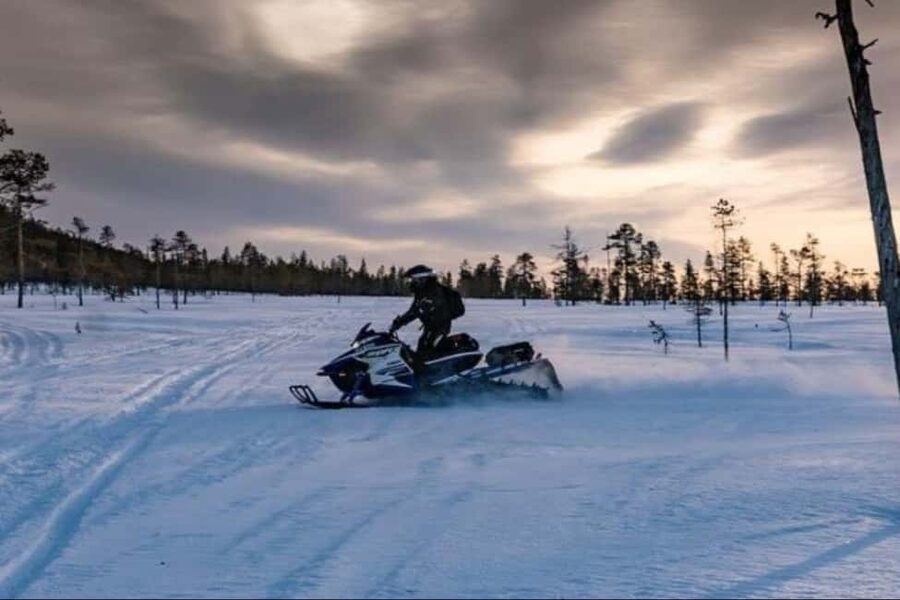 Levi: Twilight Snowmobile Safari & Stargazing Experience - Safety briefing, warm gear, and the first engine start