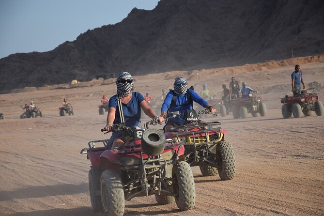 Safari Quad Bike Adventure, Camel, Show, Dinner & Stargazing - Quad bikes across the sand and the first photo stop